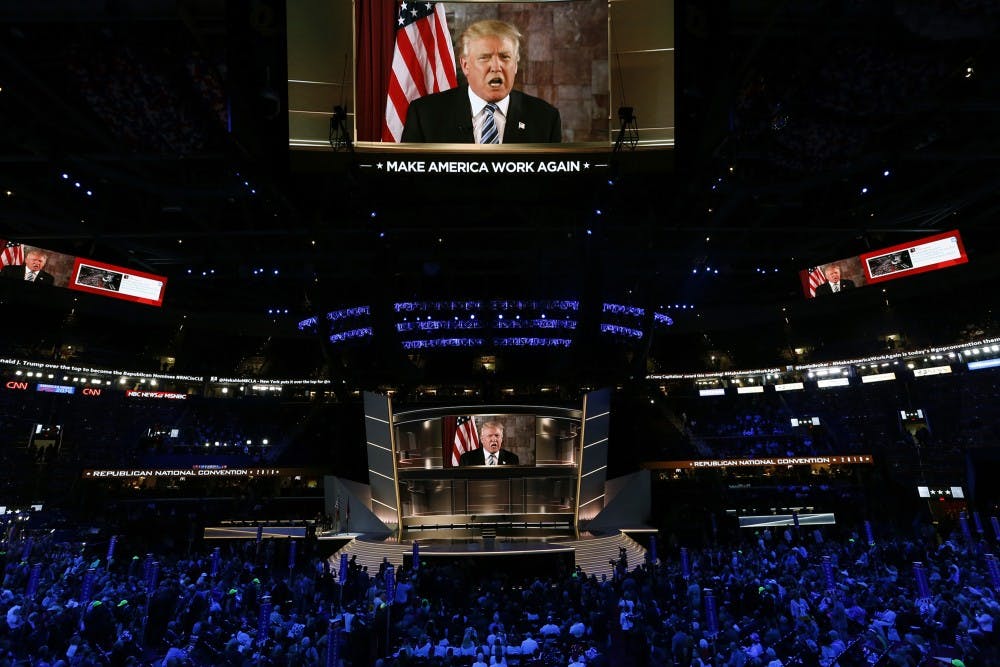 Republican Presidential nominee Donald Trump appears by satellite to address the delegates on the second day of the Republican National Convention on Tuesday, July 19, 2016, at Quicken Loans Arena in Cleveland. (Carolyn Cole/Los Angeles Times/TNS)