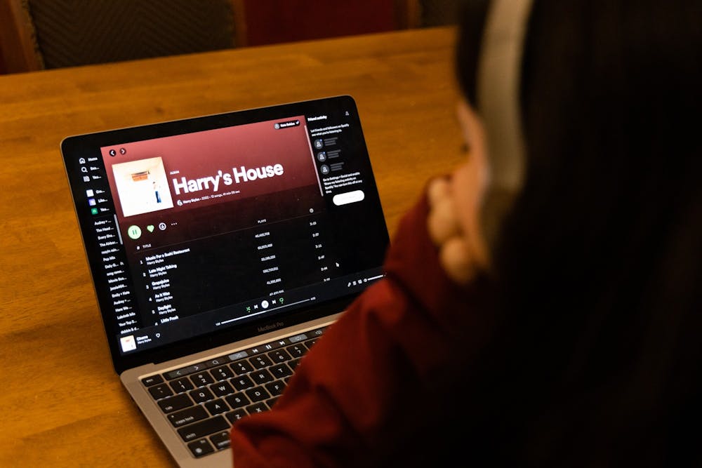 <p>A student listens to Harry Styles' new album, "Harry's House." The album was released on May 20, 2022.&nbsp;</p>