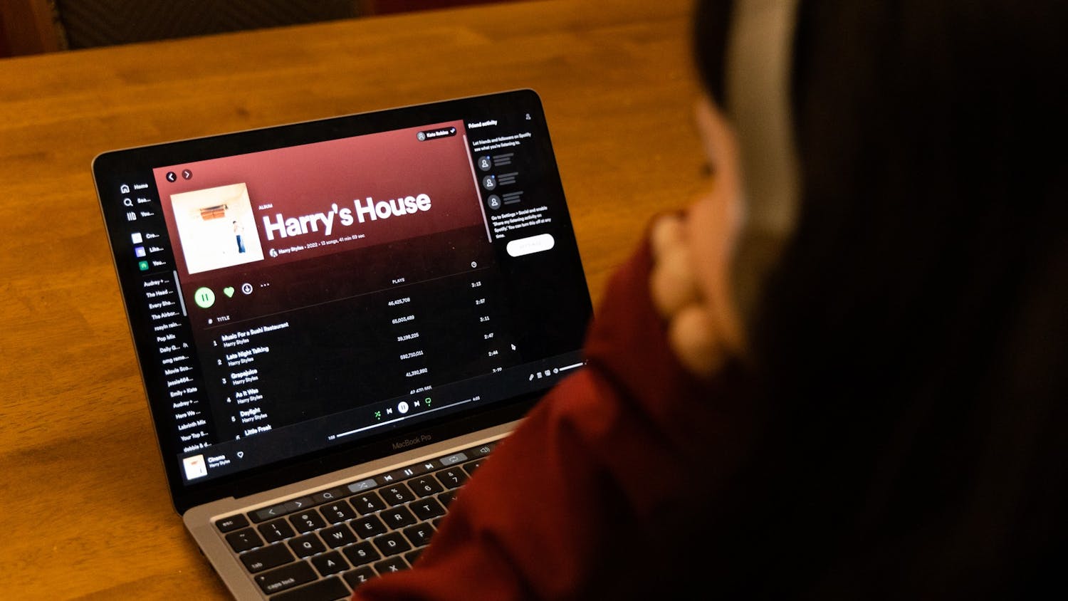 A student listens to Harry Styles' new album, "Harry's House." The album was released on May 20, 2022.&nbsp;