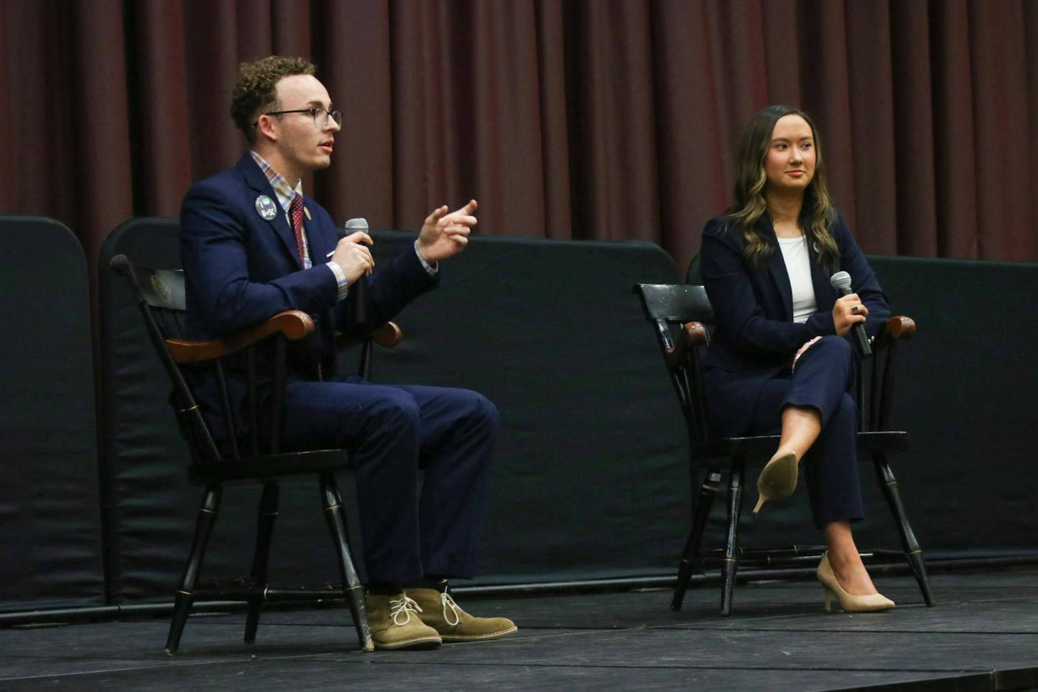 Student body presidential candidates third-year political science student Reilly Arford (left) and third-year public relations student Emily "Emmie" Thompson (right) on stage debating on Feb. 15, 2023. They are the only two presidential candidates this election 鶹С򽴫ý.&nbsp;
