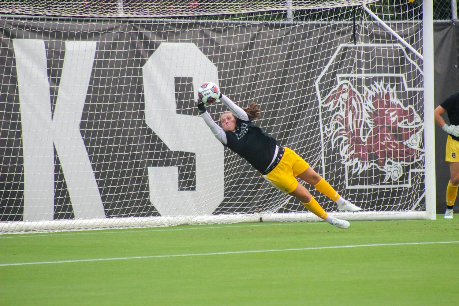 Senior goalkeeper Heather Hinz warming up before the Gamecocks' season opener on August 18, 2022. The No. 4 South Carolina women’s soccer team defeated Connecticut 3-0 in Storrs, Connecticut on Aug. 25.&nbsp;