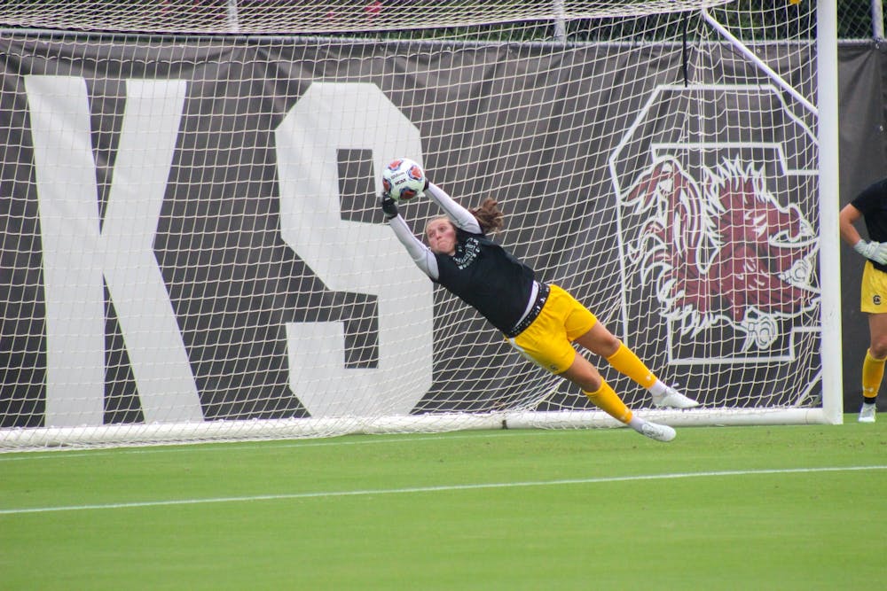 <p>Senior goalkeeper Heather Hinz warming up before the Gamecocks' season opener on August 18, 2022. The No. 4 South Carolina women’s soccer team defeated Connecticut 3-0 in Storrs, Connecticut on Aug. 25.&nbsp;</p>