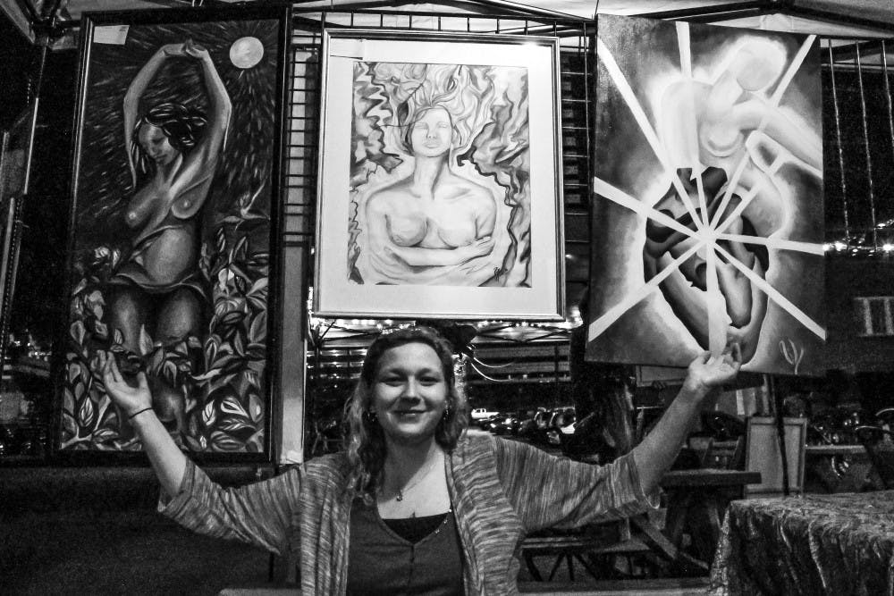 	<p>Elementary art school teacher Lily Todd displays her work at the 23rd-annual Vista Art Crawl on Thursday. Todd was joined by local artists as well as artists who traveled across the Atlantic to display their work in Columbia.</p>