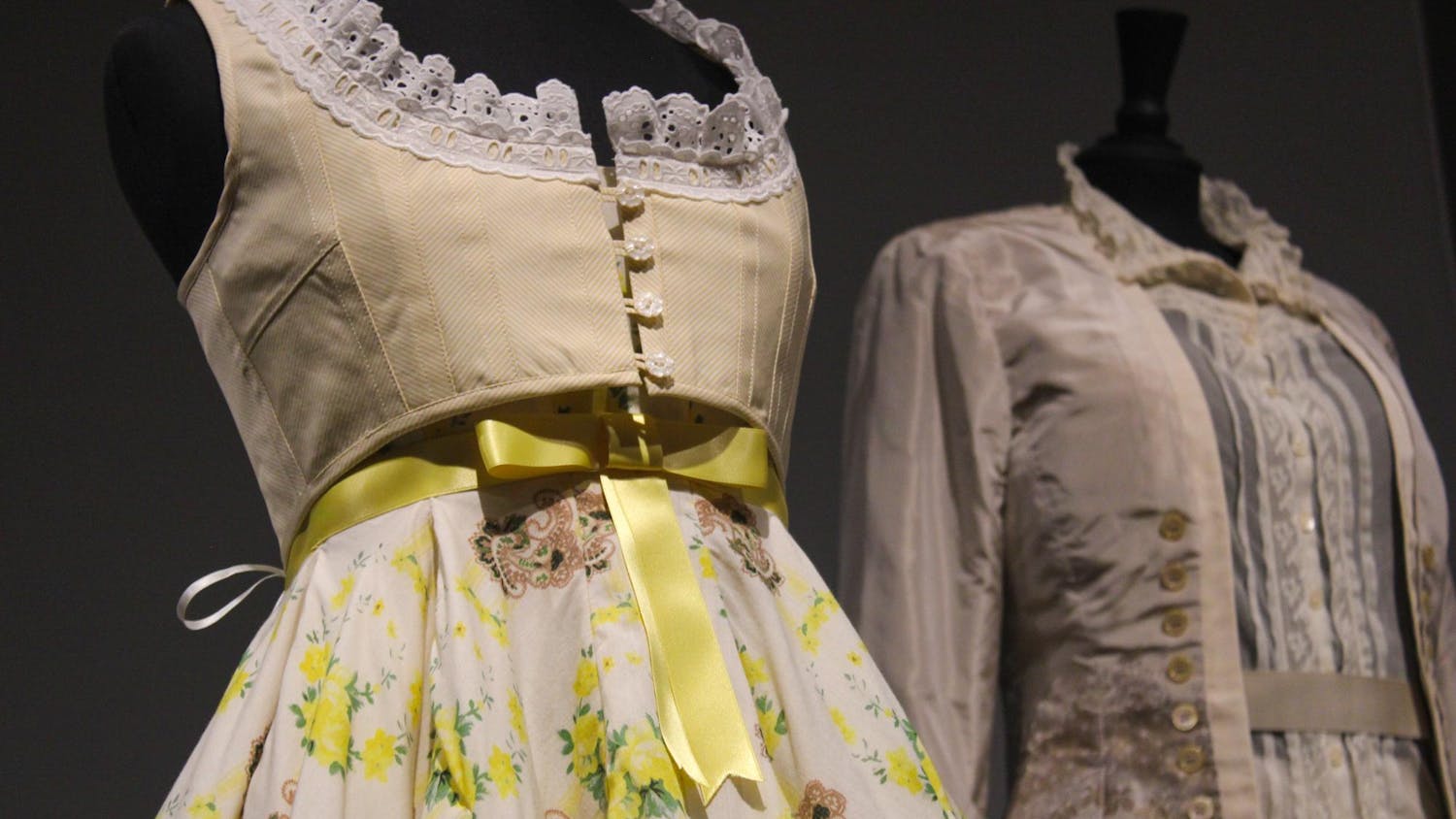 Details of a yellow floral dress designed by Lee Alexander McQueen on display at “Rendez-Vous,” at the Columbia Museum of Art on Jan. 9, 2024. The museum’s rotating exhibit has been on display since early October of 2023 and is set to close on Jan. 21, 2024.