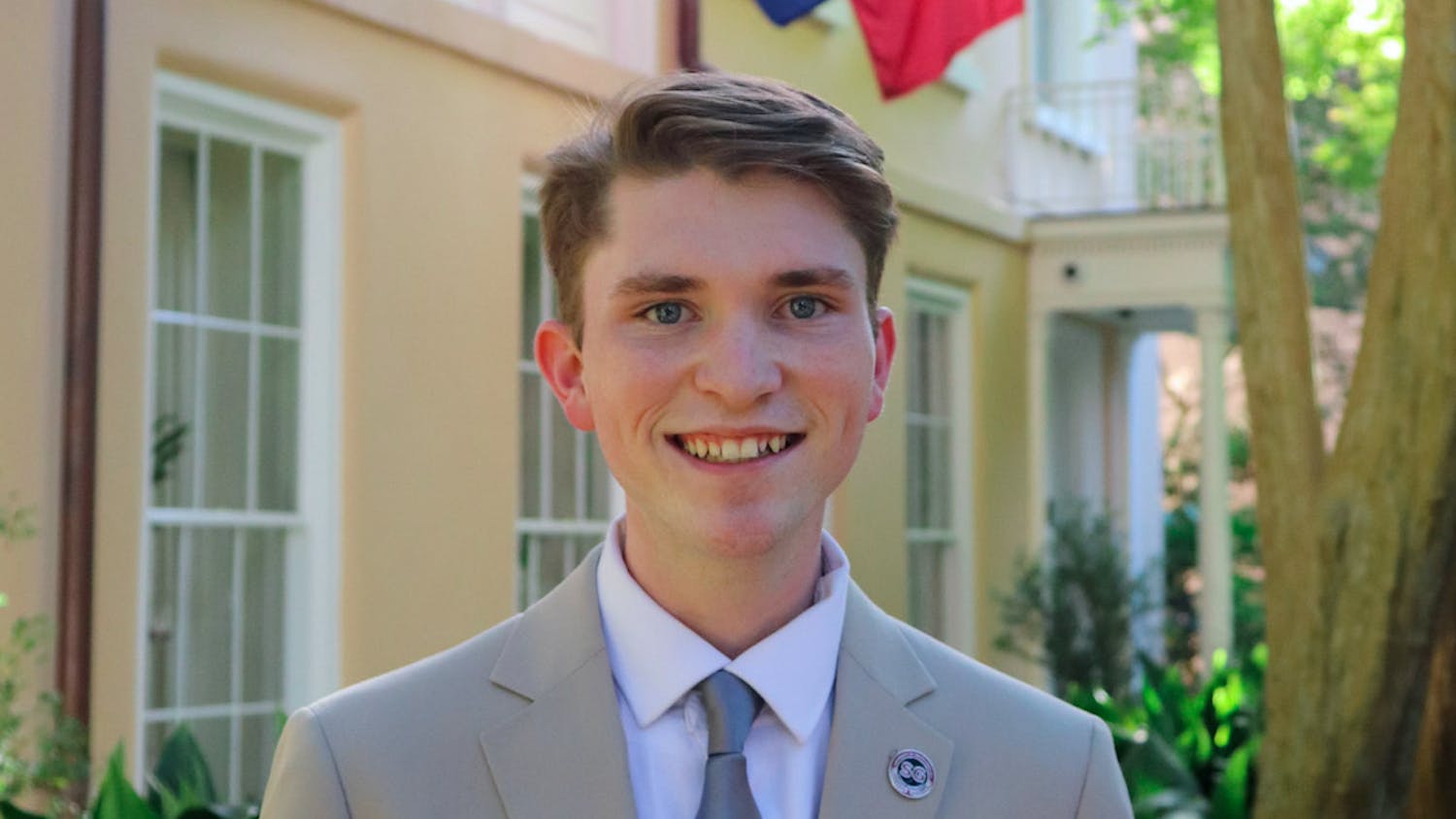 FILE—Speaker of the student senate Noah Glasgow poses for a picture in front of the president's house. Glasgow will step down on Jan. 18 to pursue an internship with the U.S. Department of State. 