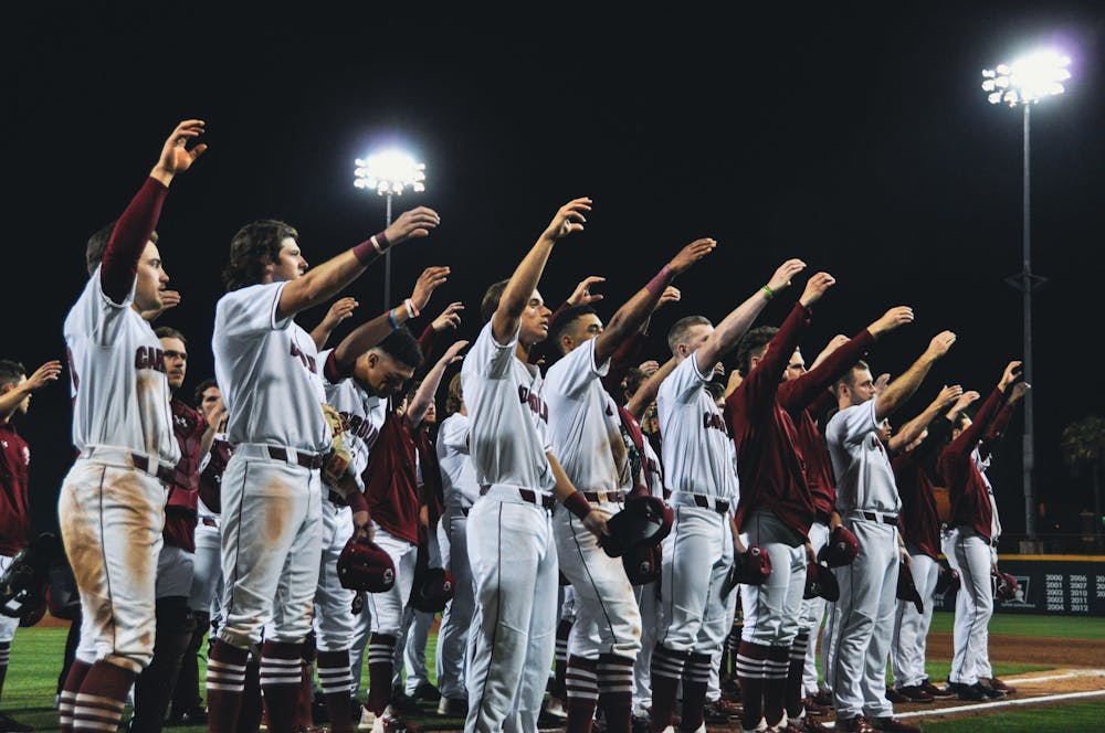 <p>FILE—The South Carolina baseball team celebrates a victory delivering the alma mater on Sunday night, March 20, 2022.&nbsp;</p>