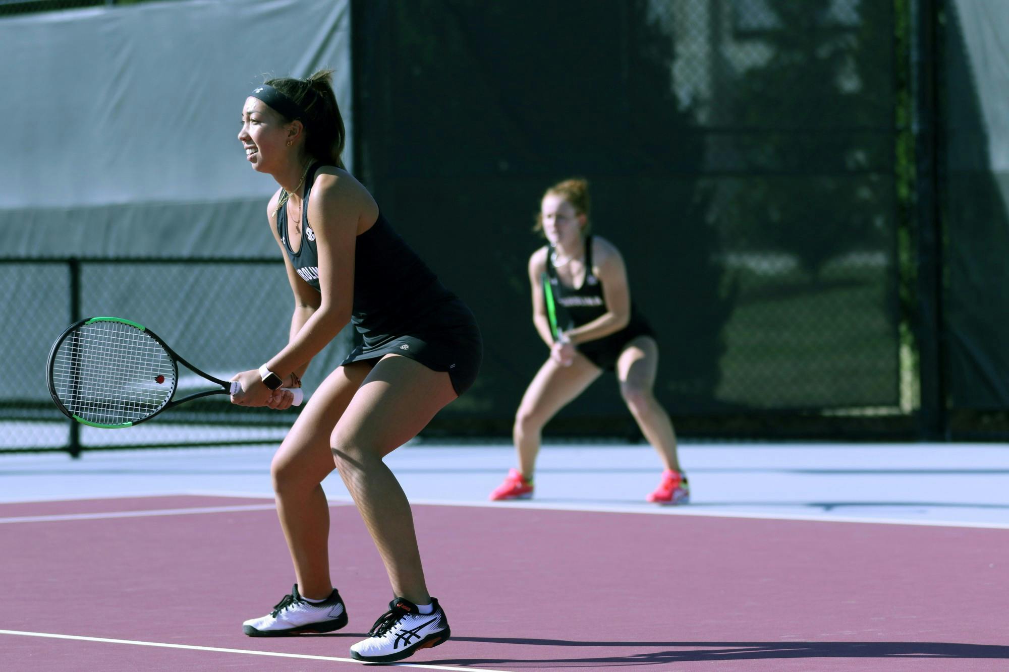 Senior Mia Horvit and her doubles partner, junior Megan Davies, set up for the next point in their match against Clemson. Overall, the Gamecocks defeated Clemson 6-1.