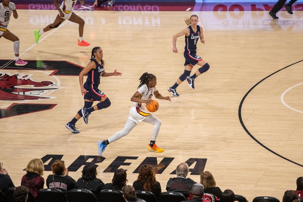 <p>FILE — Sophomore guard MiLaysia Fulwiley dribbles down the court against defenders from UConn on Feb. 16, 2025. With a score of 87-58, No. 7 UConn ended No. 4 South Carolina’s 71-home game winning streak.</p>