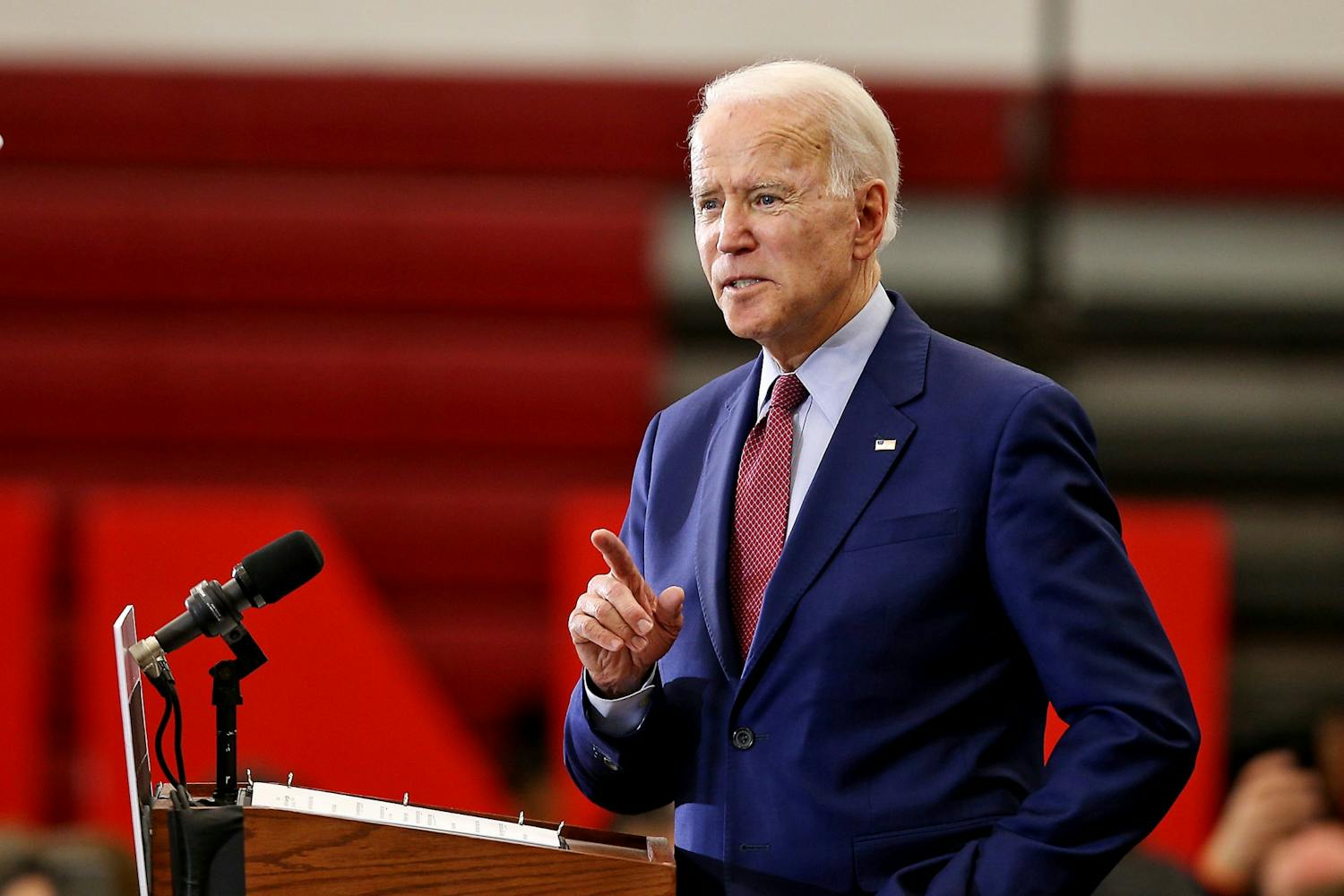 &nbsp;President Joe Biden speaks while standing at a podium.