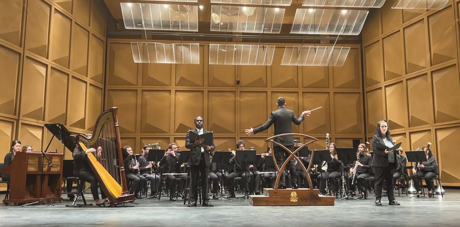 The ɫɫƵ wind ensemble performs its iteration of New Morning for the World by Joseph Schwantner at the Kroger Center on Feb. 10, 2023. The ensemble is conducted by Cormac Cannon, the director of bands and a professor at the ɫɫƵ School of Music.&nbsp;