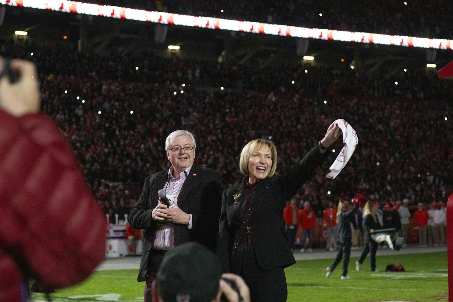 University of South Carolina President Michael Amiridis and his wife, Ero Aggelopoulou-Amiridis, lead Williams-Brice Stadium in the “Game-Cock” chant prior to kickoff on Nov. 25, 2023. Amiridis became the 30th president of the university on July 1, 2022.