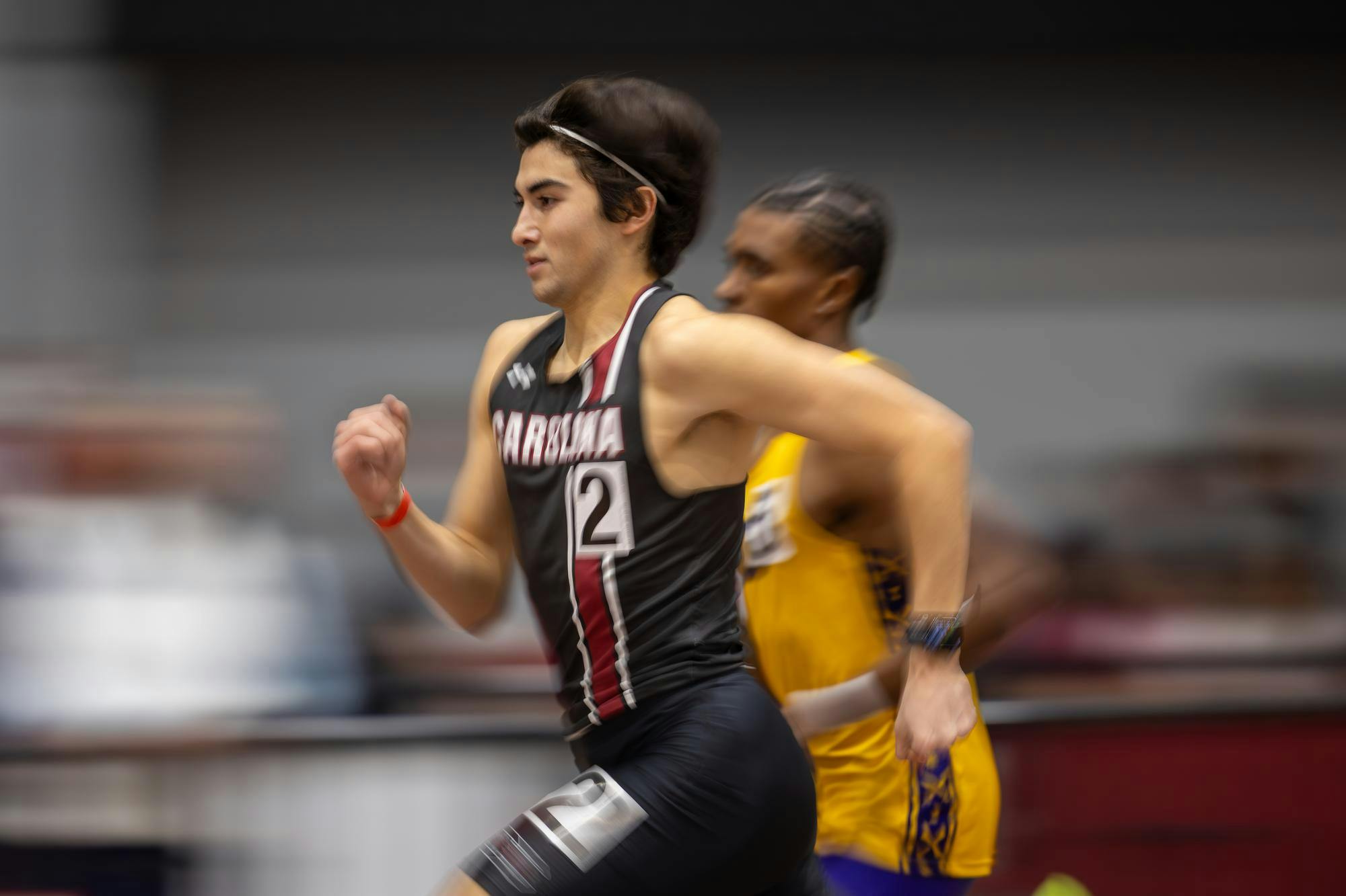 Junior middle distance runner Carlos Lanzagorta-Ruiz sprints down the track during the men's 800m at the Carolina Classic track and field meet on Feb. 6, 2026. After not finishing the 800m, Lanzagorta-Ruiz eventually finished second in the mile sprint.