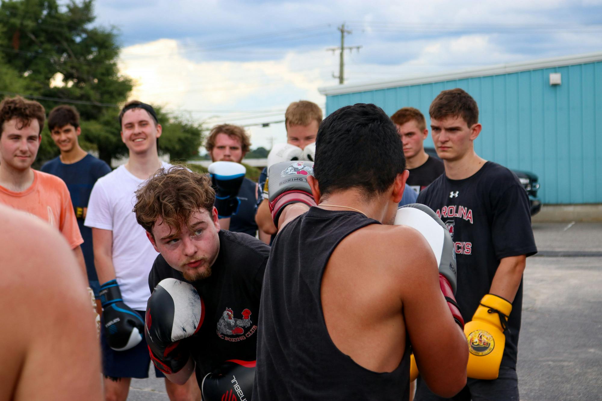 Club President Ben McMullen leads lesson on combo creation and how to quickly strike your opponent after dodging a parry. The Carolina Boxing Club gathered Sept. 12, 2022, at Battle Boxing Gym to begin training for upcoming matches.&nbsp;