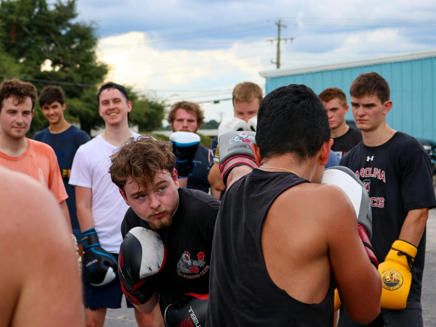 Club President Ben McMullen leads lesson on combo creation and how to quickly strike your opponent after dodging a parry. The Carolina Boxing Club gathered Sept. 12, 2022, at Battle Boxing Gym to begin training for upcoming matches.&nbsp;