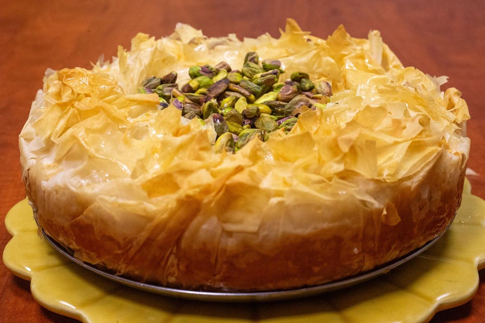 <p>A pistachio baklava-inspired cheesecake sits on a table inside the Russell House on the University of South Carolina campus on Aug. 28, 2024. Baklava is a dessert common in the countries of Turkey and Greece and consists of ingredients such as nuts, honey and filo.</p>