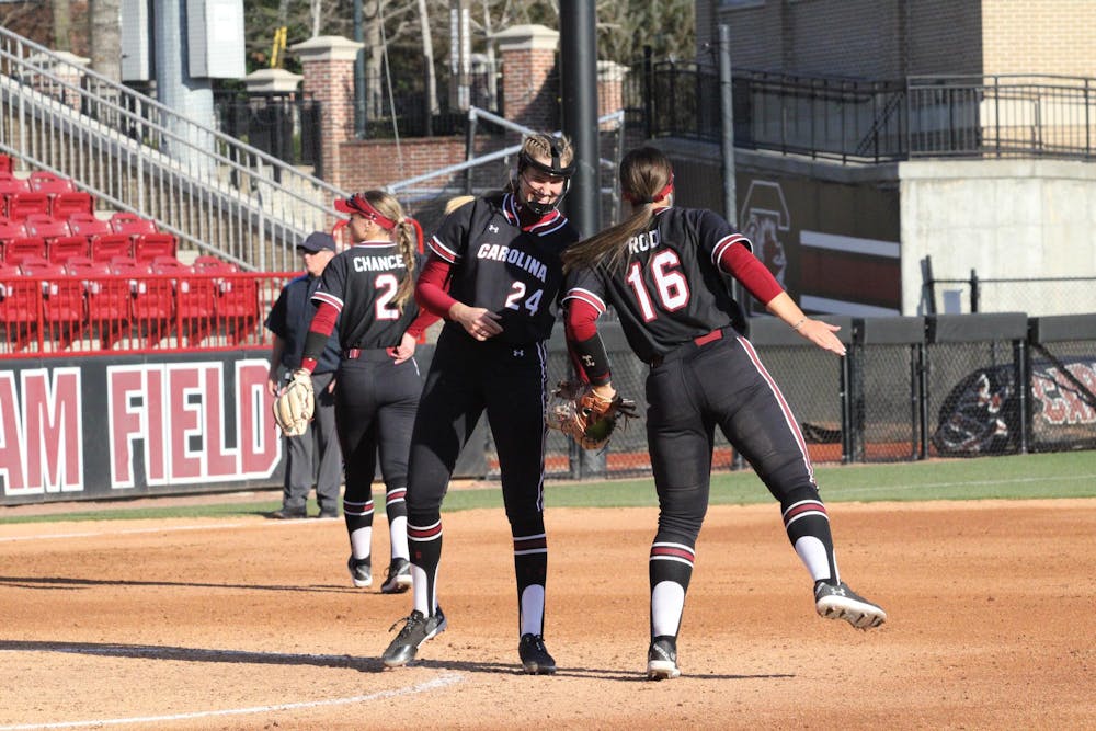 <p>FILE — Junior infielder Arianna Rodi and sophomore pitcher Nealy Lamb celebrate a strikeout in their game against Fordham on Feb. 22, 2025 at Beckham Field. The Gamecocks are 16-0 on the season and will travel to face the Duke Blue Devils on Feb. 28, 2025.</p>