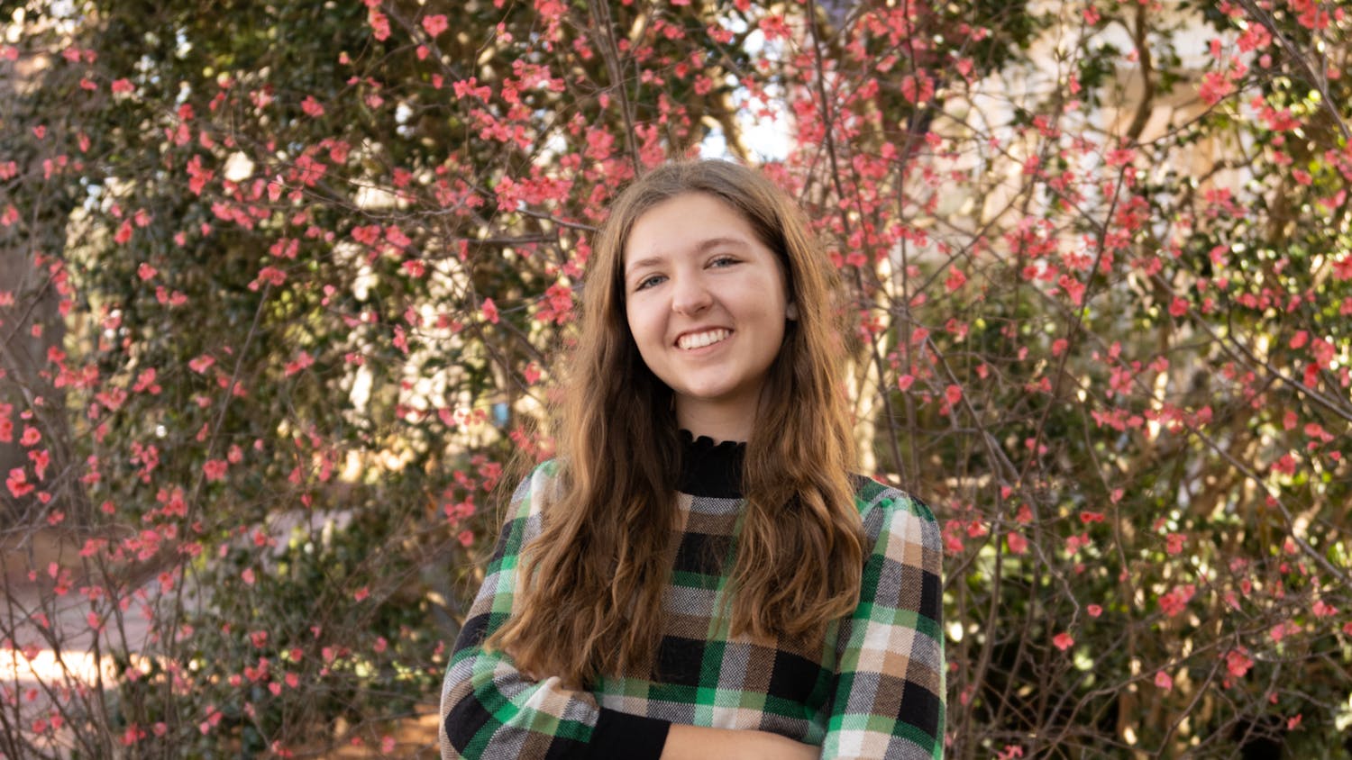 Sydney Dunlap, the editor-in-chief of The Daily Gamecock, poses on the horseshoe on Feb. 24, 2023. Dunlap is diagnosed with generalized anxiety disorder. 
