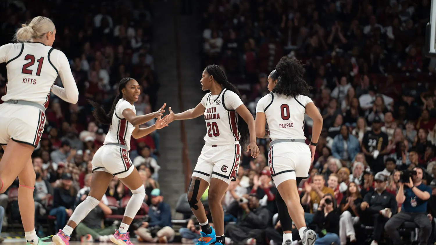 FILE — Senior forward Sania Feagin high-fives teammate senior guard Bree Hall after scoring during the Gamecocks' matchup against the Auburn Tigers at the Colonial Life Arena on February 2, 2025. The team has one regular season game remaining, against No. 15 Kentucky on March 2, 2025 at home.
