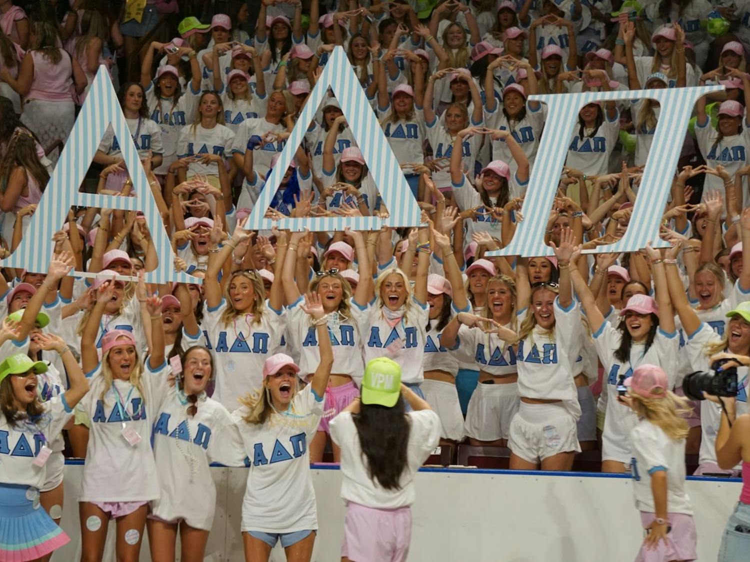 Members of Alpha Delta Pi cheer in the Colonial Life Arena as senior members take videos and photos on Aug. 17, 2025. The arena was filled with excitement as chapters got ready to welcome new members to their sororities.