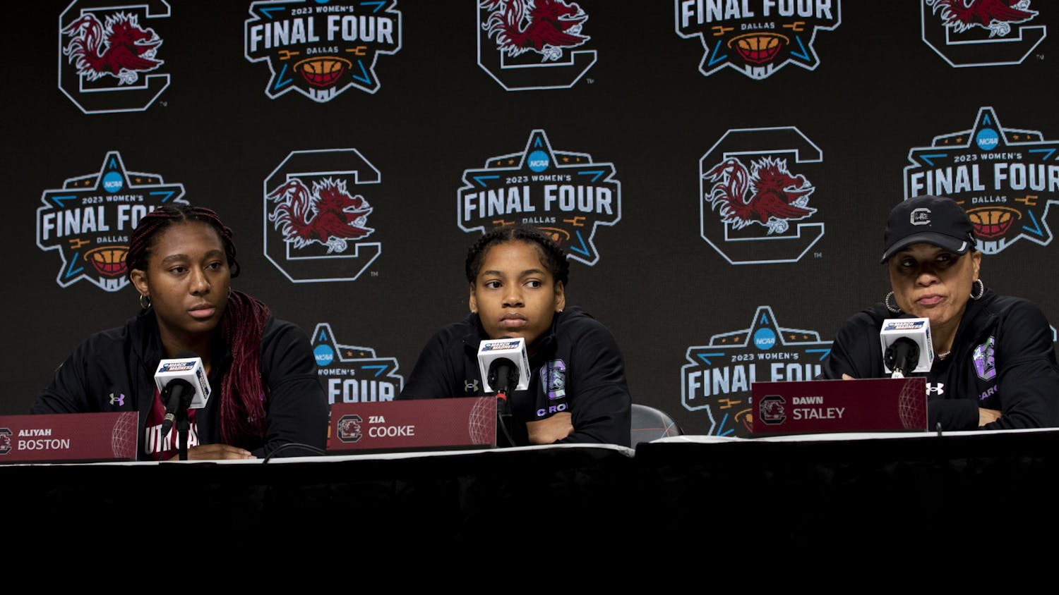 Senior guard Zia Cooke, senior forward Aliyah Boston and head coach Dawn Staley keep a stern composure while listening to the media's questions at the Women’s Final Four Pregame Press Conference on March 30, 2023, in Dallas, Texas. This is Staley’s third consecutive year leading the Gamecocks to the Final Four.&nbsp;