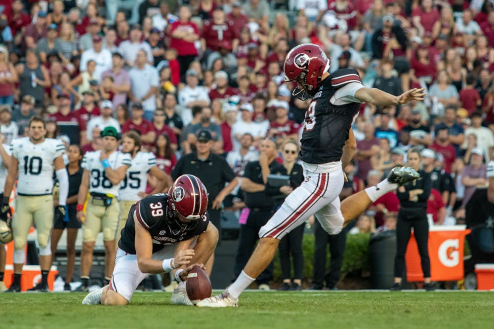 <p>Redshirt senior kicker Parker White kicks a field goal in a game against Vanderbilt. White broke USC's all-time scoring record with a field goal in the Duke's Mayo Bowl.</p>
