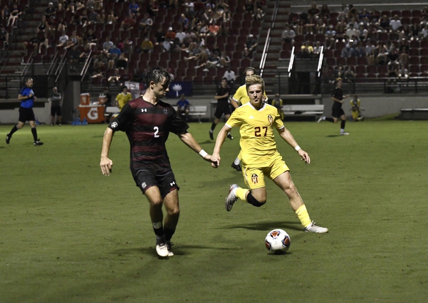 #2 Sophomore Justin Kopay takes a throw in during Saturday's mens soccer game against the Winthrop Eagles.&nbsp;
