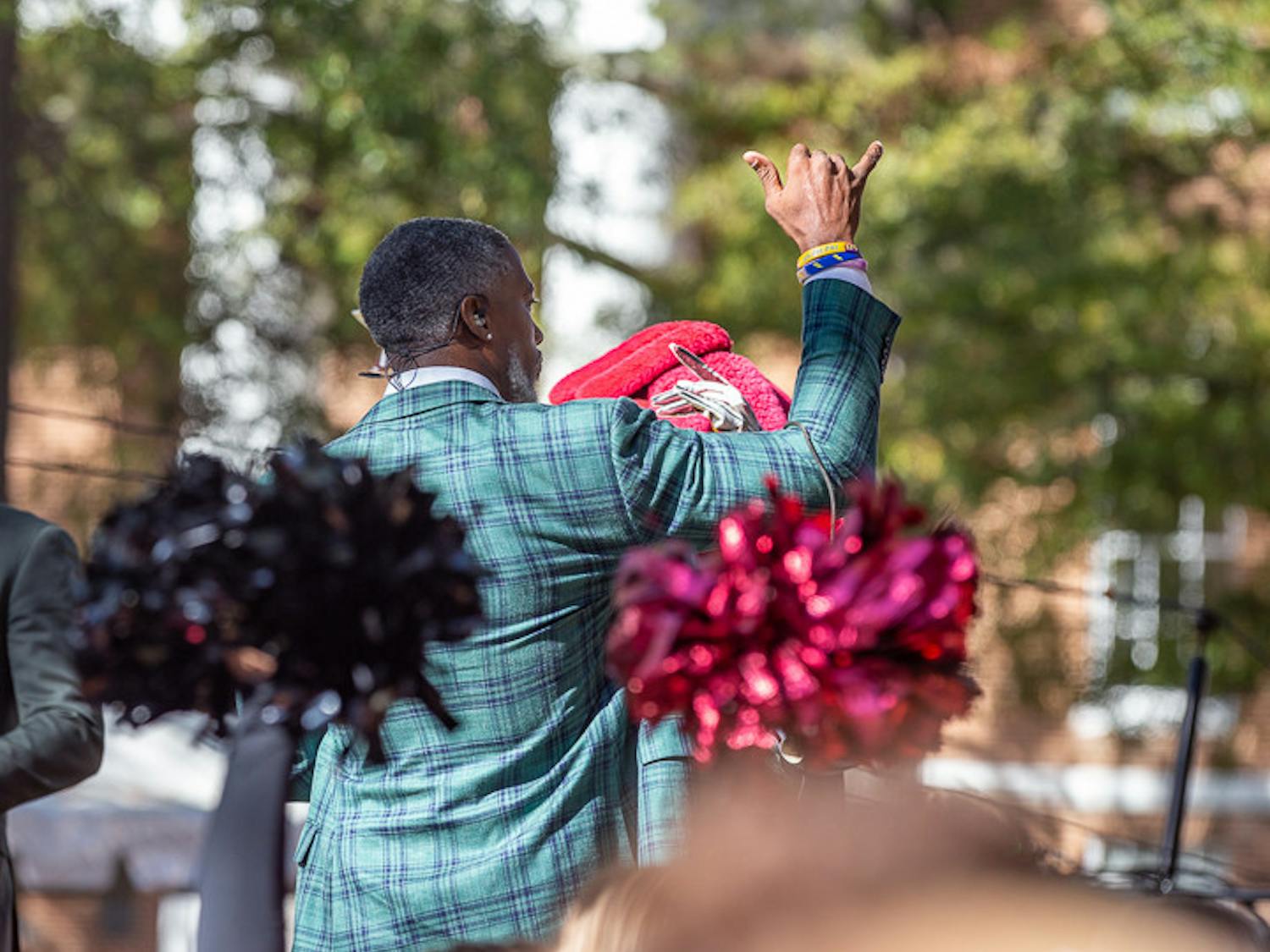 Roman Harper gives a Spurs Up signal at the end of the SEC Nation morning show on Nov. 19, 2022. Harper played safety for Alabama and the New Orleans Saints.