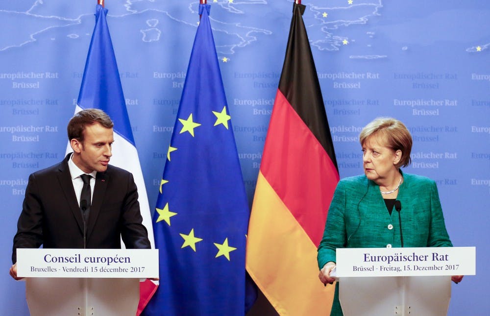 Emmanuel Macron, French President with Angela Merkel, Chancellor of Germany on joint press conference in Brussels, Belgium at the European Council summit on December 15, 2017. (Dominika Zarzycka/NurPhoto/Sipa USA/TNS)