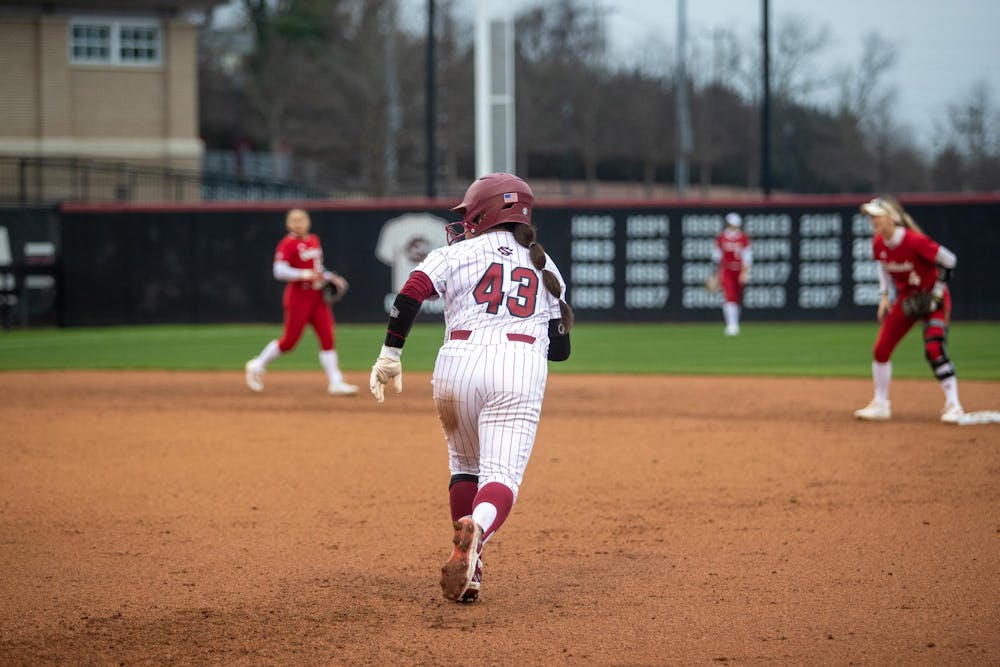 <p>FILE — Redshirt junior outfielder Quincee Lilio runs to second as they face off against Miami Ohio on Feb. 15, 2025. The Gamecocks defeated the RedHawks 12-2 in five innings. </p>