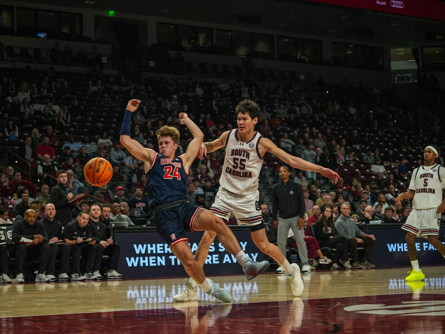 Senior guard Mike Sharavjamts forces a Radford player off balance as the two battle for a loose ball during the Gamecocks’ home matchup on Nov. 18, 2025, at Colonial Life Arena. The play drew loud reactions from the crowd and helped shift momentum as South Carolina continued to control the pace of the game.