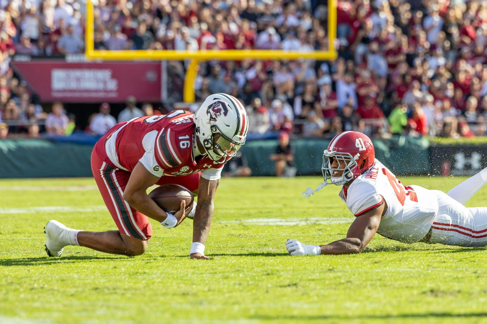 FILE — Redshirt sophomore quarterback LaNorris Sellers runs the ball into the end zone for a touchdown against Alabama on Oct. 25, 2025, at Williams-Brice Stadium. Sellers tallied 84 rushing yards and 222 passing yards in the Gamecocks’ 29-22 loss to the Crimson Tide.