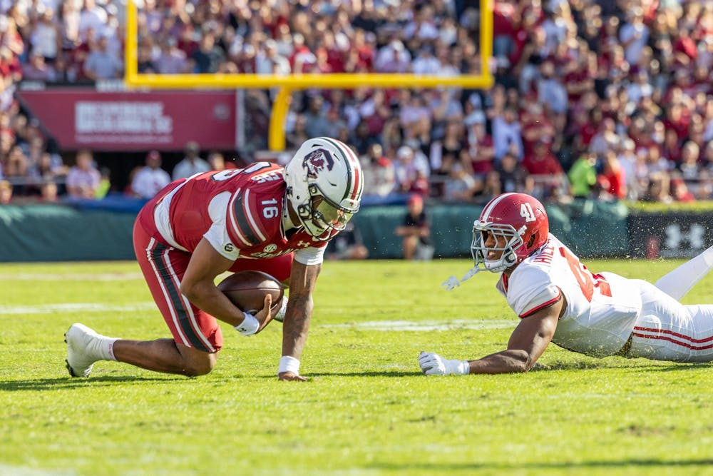 <p>FILE — Redshirt sophomore quarterback LaNorris Sellers runs the ball into the end zone for a touchdown against Alabama on Oct. 25, 2025, at Williams-Brice Stadium. Sellers tallied 84 rushing yards and 222 passing yards in the Gamecocks’ 29-22 loss to the Crimson Tide.</p>