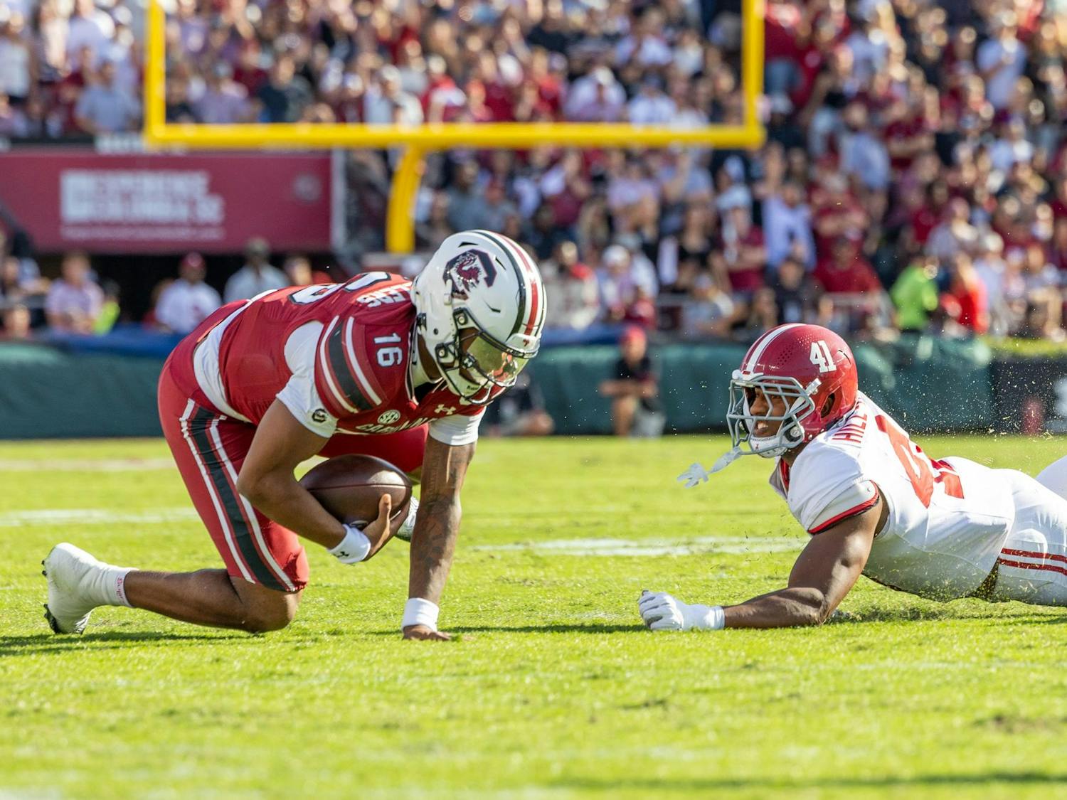 FILE — Redshirt sophomore quarterback LaNorris Sellers runs the ball into the end zone for a touchdown against Alabama on Oct. 25, 2025, at Williams-Brice Stadium. Sellers tallied 84 rushing yards and 222 passing yards in the Gamecocks’ 29-22 loss to the Crimson Tide.