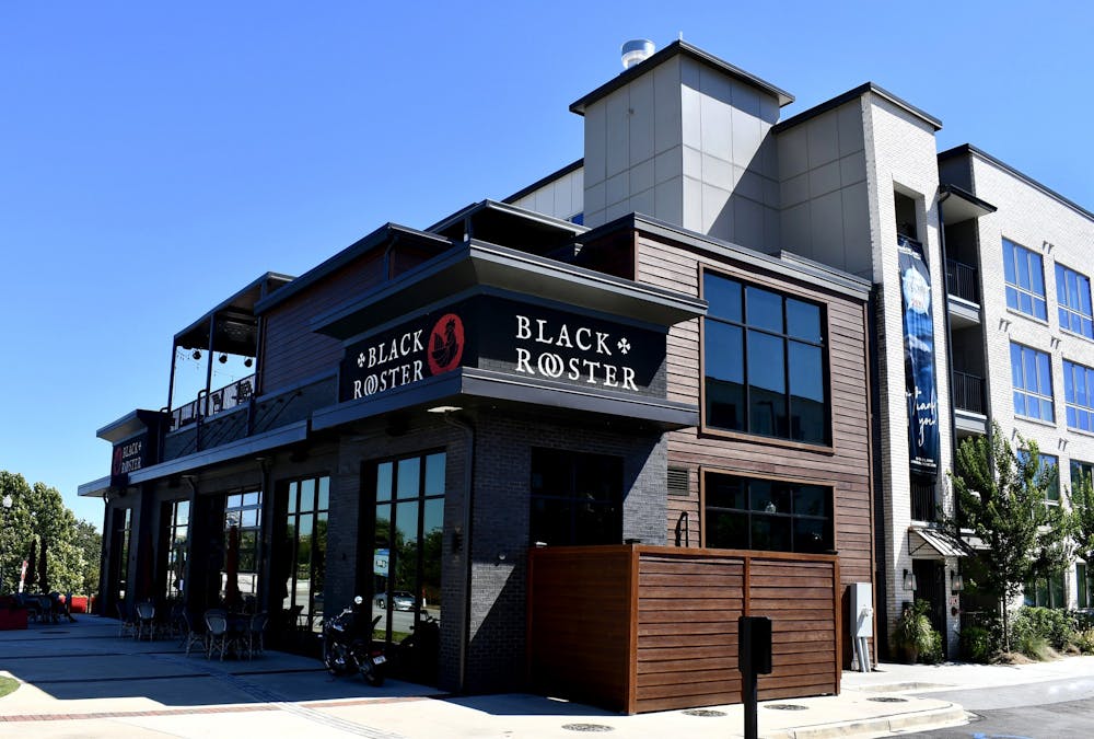 Black rooster offers views of the river and a rooftop area that is a favorite spot for customers. 