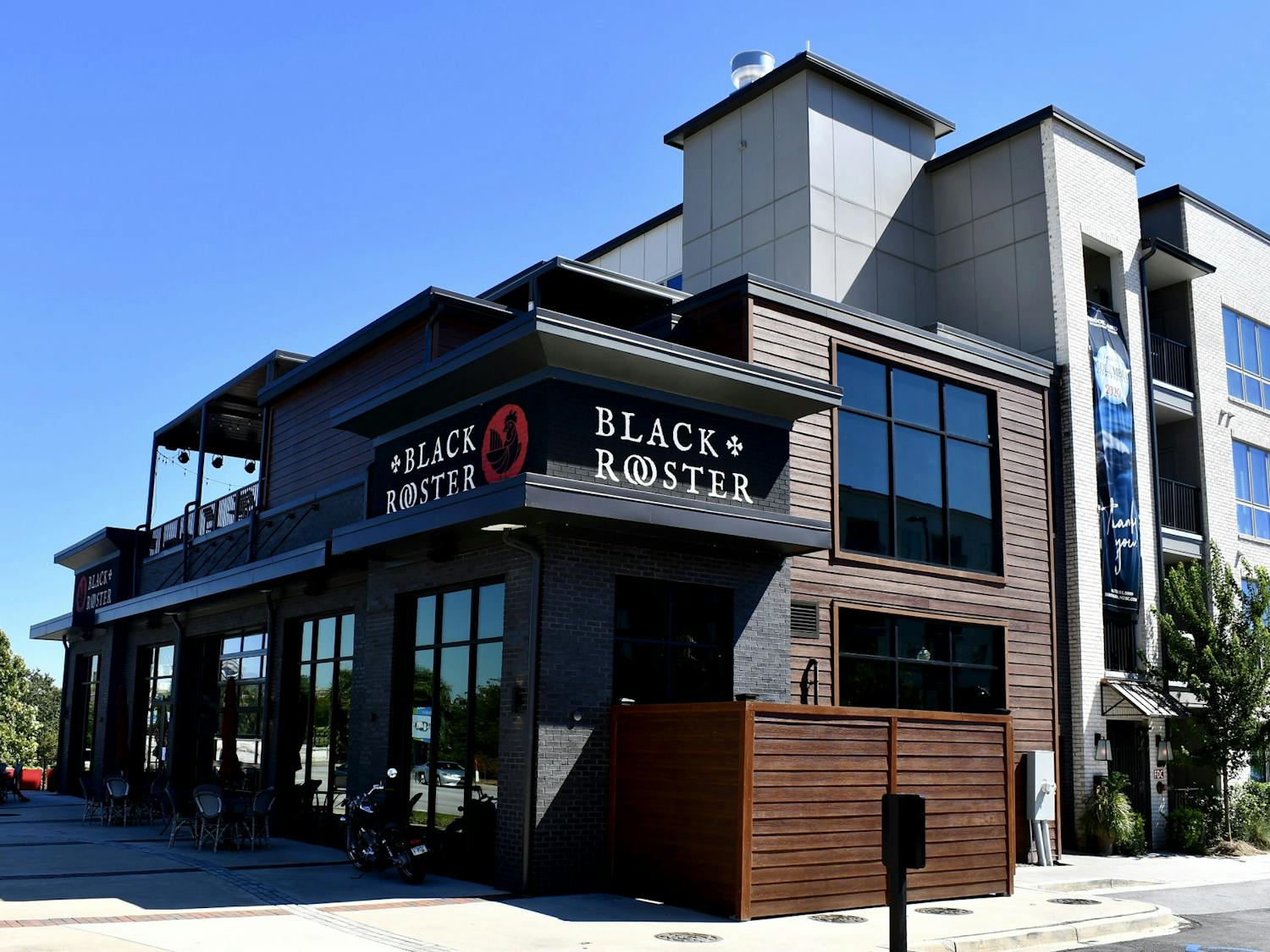 Black rooster offers views of the river and a rooftop area that is a favorite spot for customers.