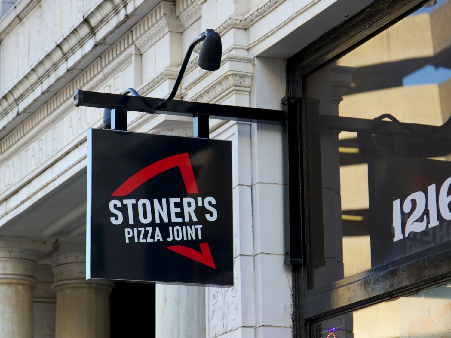 A close of up Stoner's Pizza Joint's sign outside its 1216 Washington St. location in Columbia, SC.