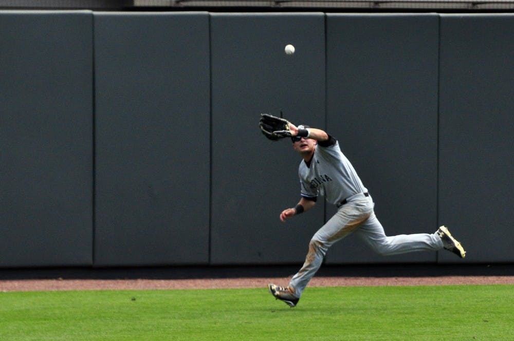 Outfielder Graham Saiko chases down a fly ball.
