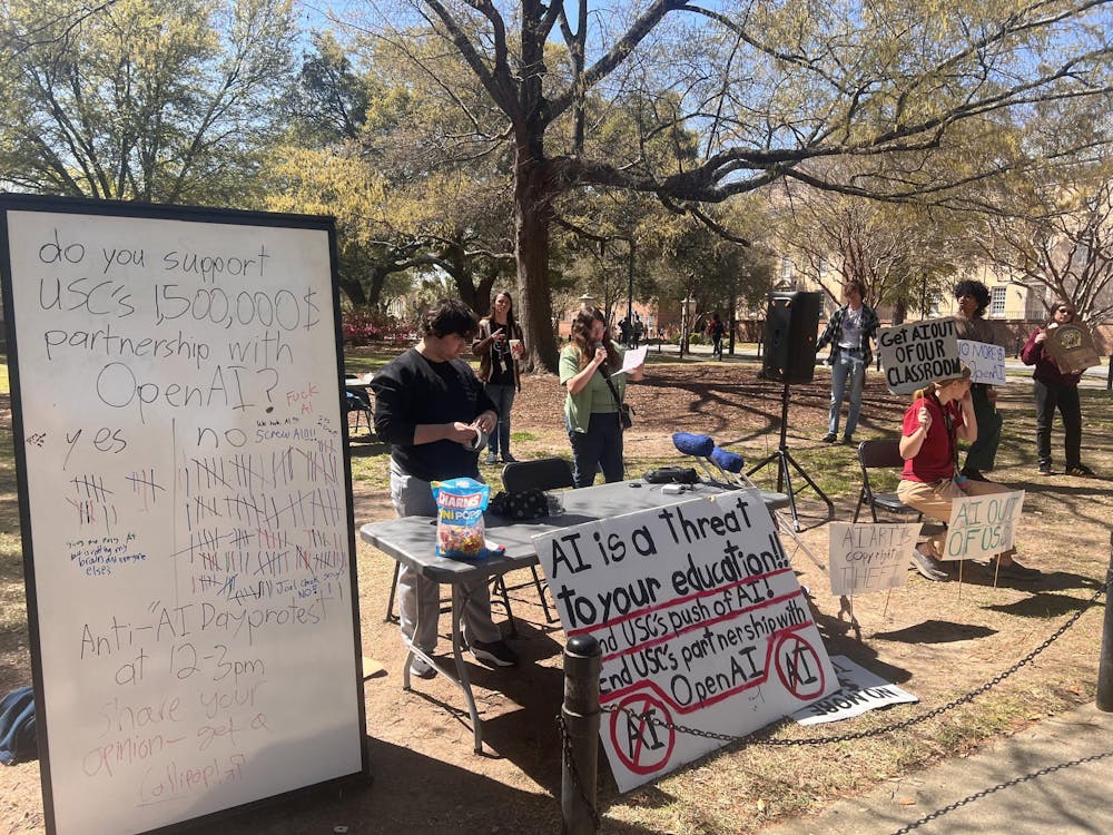 <p>Student protester Danielle Mejias speaks against USC’s AI Day at a student-organized event.</p>
