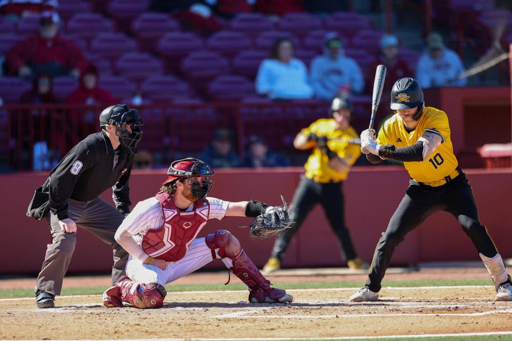 <p>FILE —&nbsp;Fifth-year catcher Talmadge LeCroy catches a strike at home plate during the game against Northern Kentucky University on Feb. 13, 2026. LeCroy recorded a season record of 13 putouts.</p>