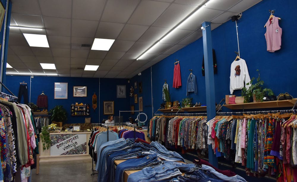 <p>A photo of the clothing racks inside Pannerpete Vintage clothing store in Five Points on March 23, 2023. The store opened on March 12 and sells a collection of vintage clothing.</p>