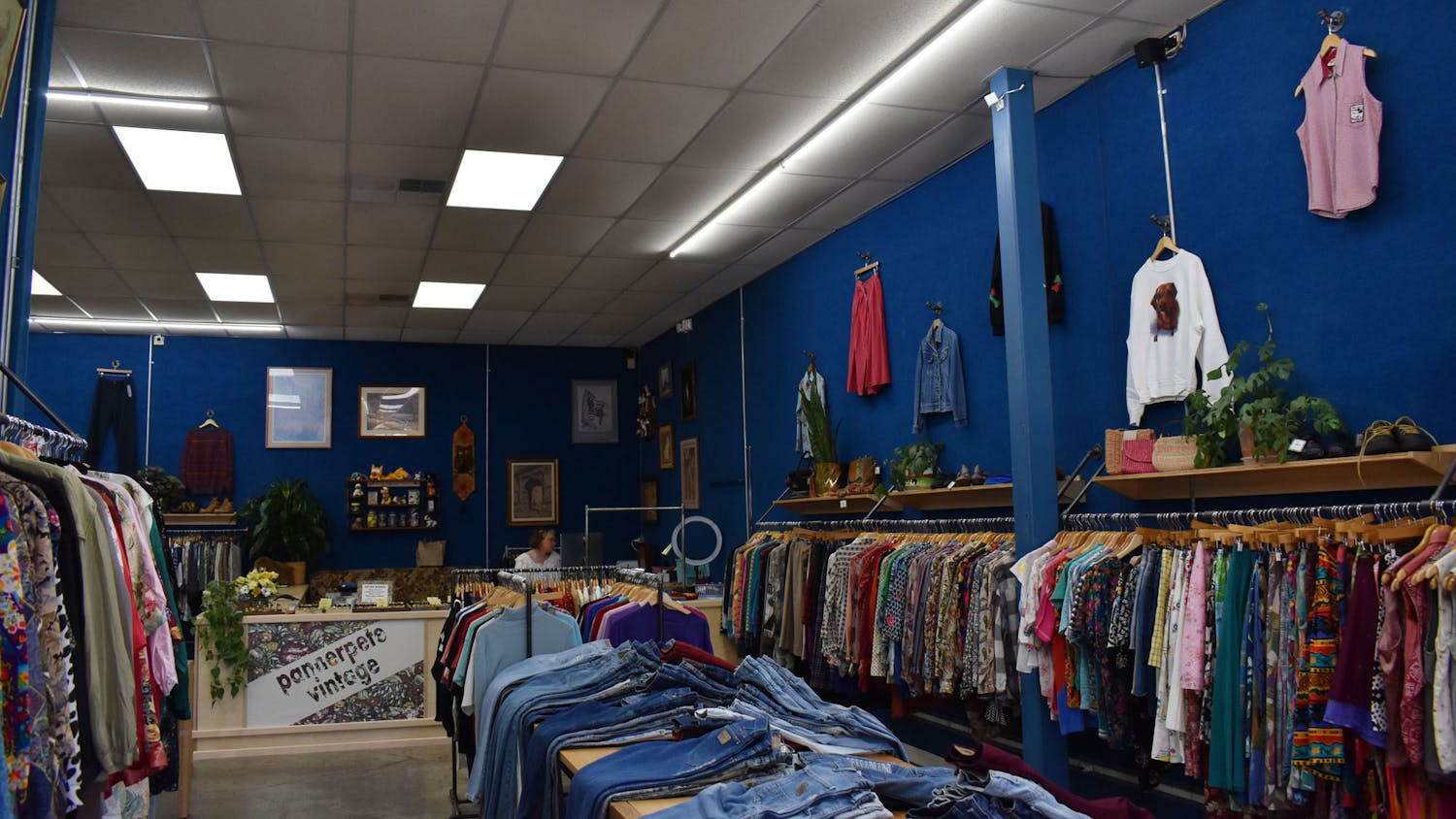 A photo of the clothing racks inside Pannerpete Vintage clothing store in Five Points on March 23, 2023. The store opened on March 12 and sells a collection of vintage clothing.