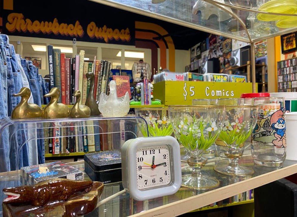 <p>Trinkets sit on a shelf at Throwback Outpost on Feb. 7, 2023. The store, located on North Beltline Boulevard in Columbia, S.C., carries an assortment of curated antiques.&nbsp;</p>