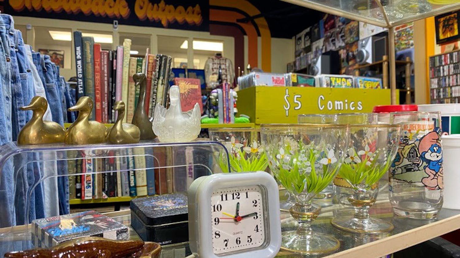 Trinkets sit on a shelf at Throwback Outpost on Feb. 7, 2023. The store, located on North Beltline Boulevard in Columbia, S.C., carries an assortment of curated antiques. 