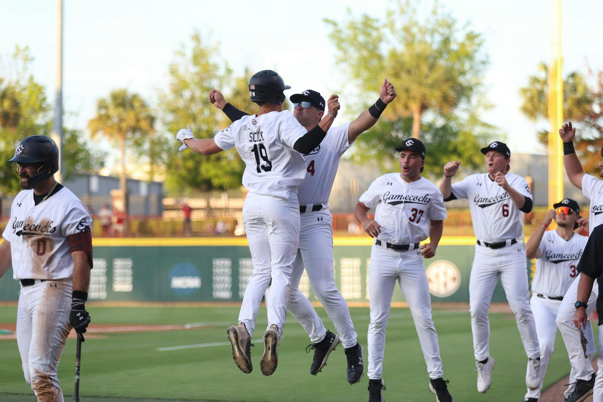 Sophomore infielder KJ Scobey and teammates celebrate after Scobey hits a home run on April 21, 2025, against Presbyterian at Founders Park. The Gamecocks won 9-3 against the Blue Hose.