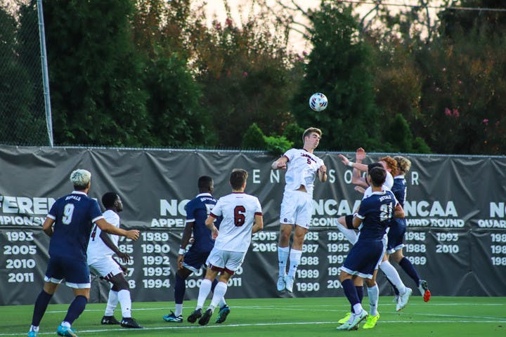 Freshman defensive midfielder William Nilsson hits a header during the South Carolina's matchup against Queens University on Sept. 20, 2022. The Gamecocks beat the Royals 3-1.
