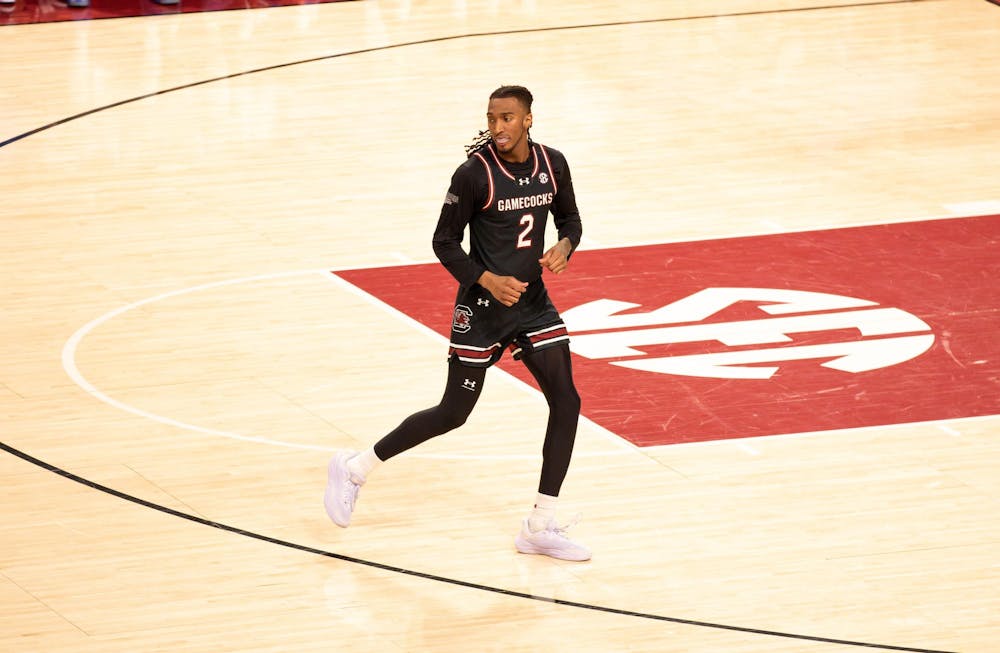 <p>Junior guard Zachary Davis hustles back on defense after sinking a basket for the Gamecocks during their matchup against the Florida Gators at Colonial Life Arena on Jan. 22, 2025. His effort helped maintain the team’s momentum in a tightly contested matchup.</p>