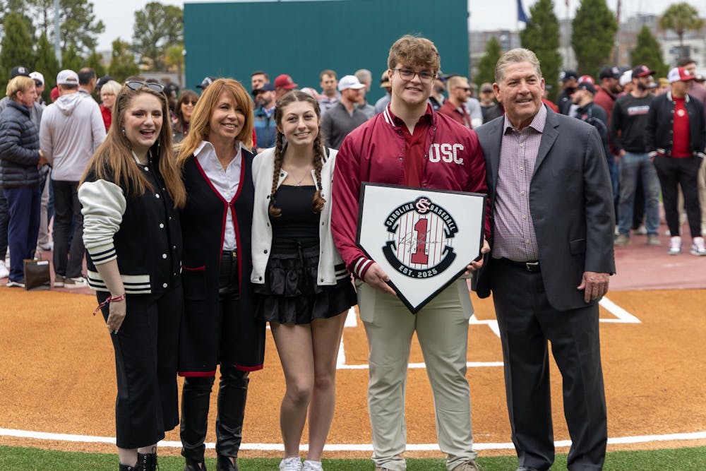 <p>FILE — Ray Tanner (far right) poses with family members during a ceremony to dedicate the field at Founders Park to Tanner before a game on Feb. 15, 2025. Tanner previously served as a baseball coach and athletic director for South Carolina, leading the baseball team to back-to-back National Championships as head coach.</p>