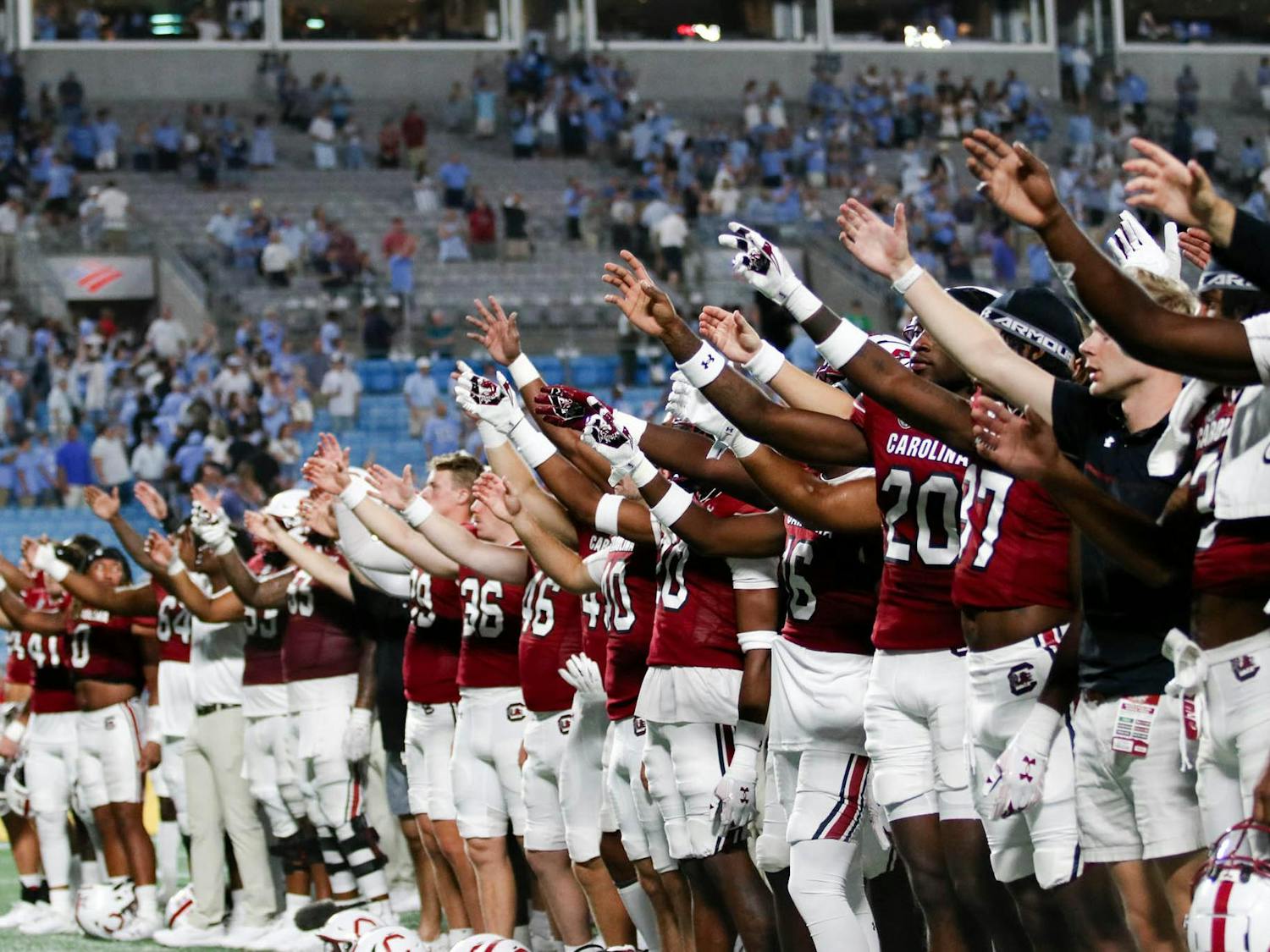 The University of South Carolina football team sings its school's alma mater at the Bank of America Stadium in Charlotte, North Carolina. The Gamecocks lost to the Tar Heels 31-17 on Sept. 2, 2023.