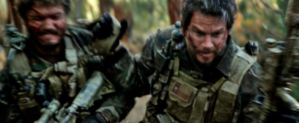 	Mark Wahlberg (right) and Emile Hirsch run and gun in the Navy SEAL war epic based on a real mission gone wrong.