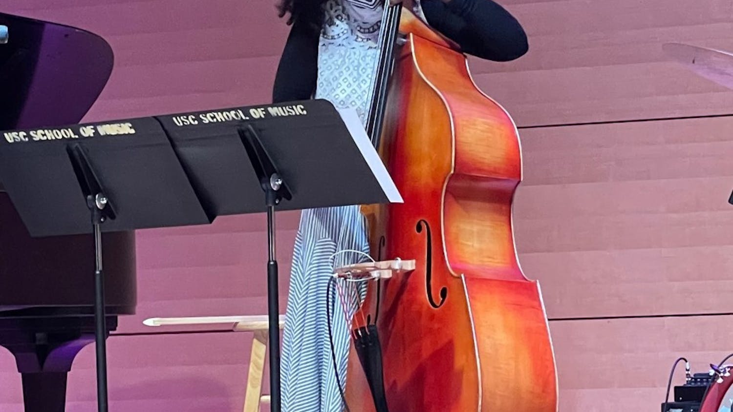 CC &amp; The Adelitas bass player Mimi Jones performs at the band's live debut concert on Oct. 25, 2021, at the Darla Moore School of Business Johnson Performance Hall. The all-female, professor-led band represents intersectionality and embraces Mexican culture in jazz music.